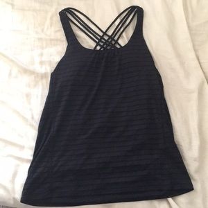 Workout tank top with attached sports bra